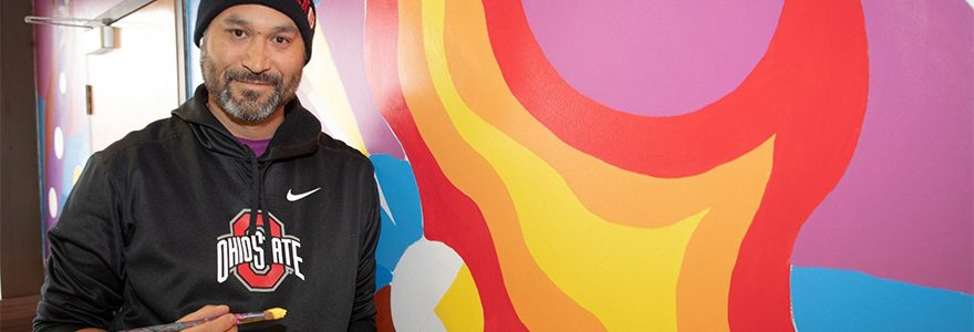 Mike Cywink, an Indigenous Studies student and staff member at Western, designed the mural with input from the community. (Chris KIndratsky/Western Communications)